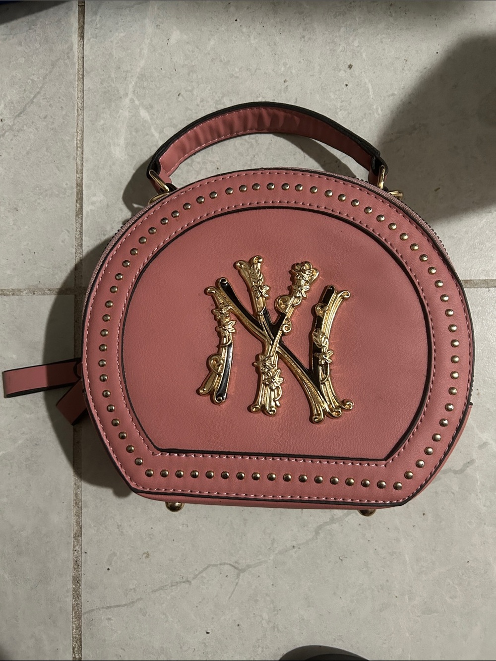 Studded Round Pink Top-Handle Bag with Gold Hardware